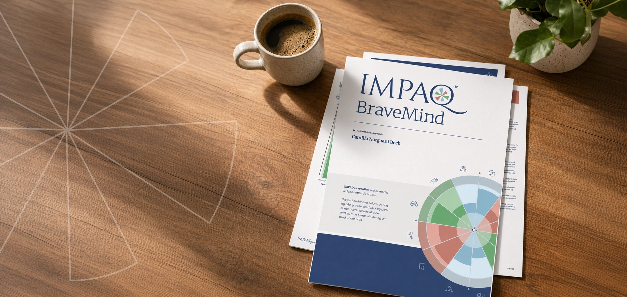 IMPAQ BraveMind-rapport på et træbord